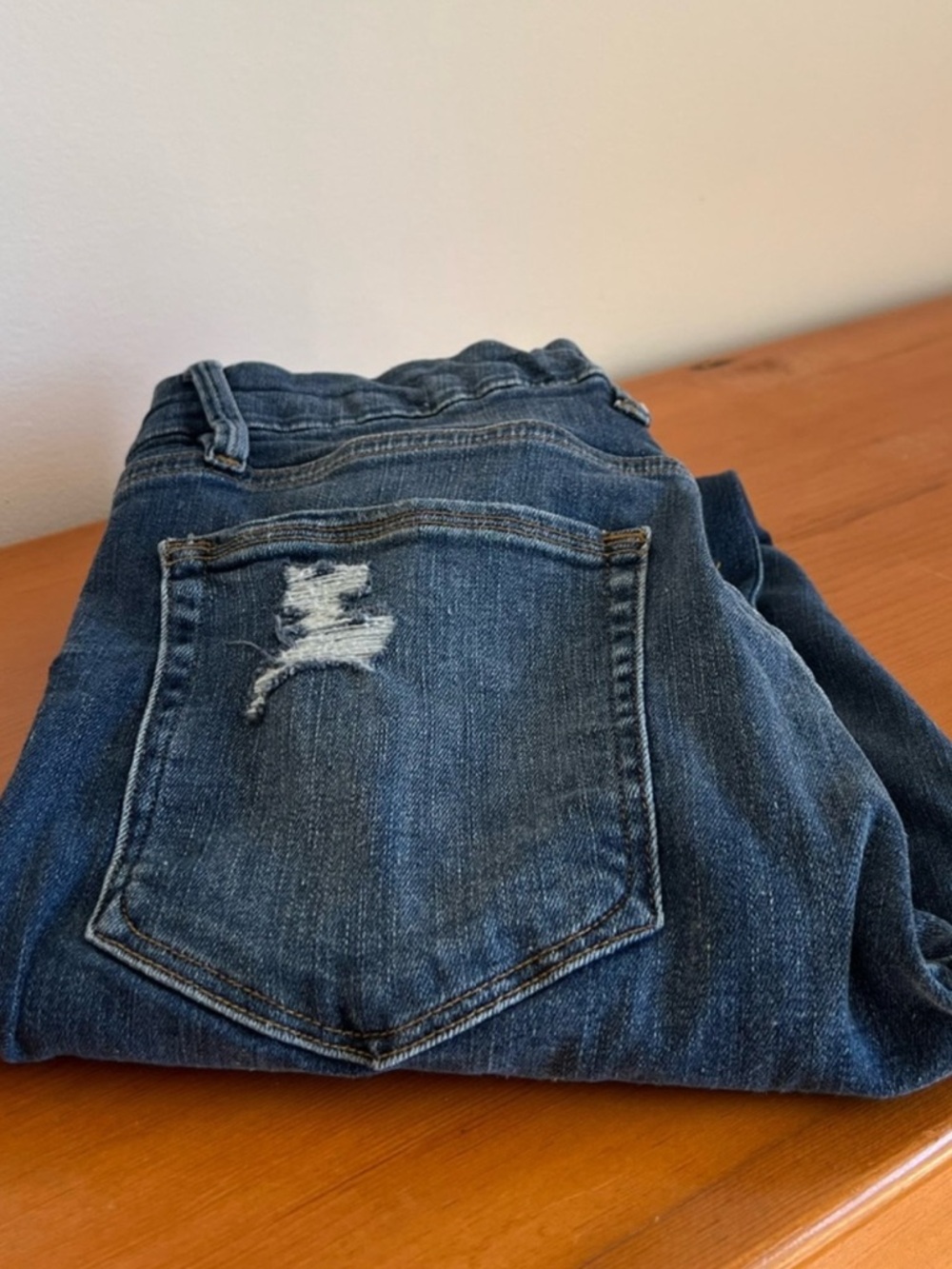 Good American Dark Blue Skinny Jeans with Distressed Back Pocket